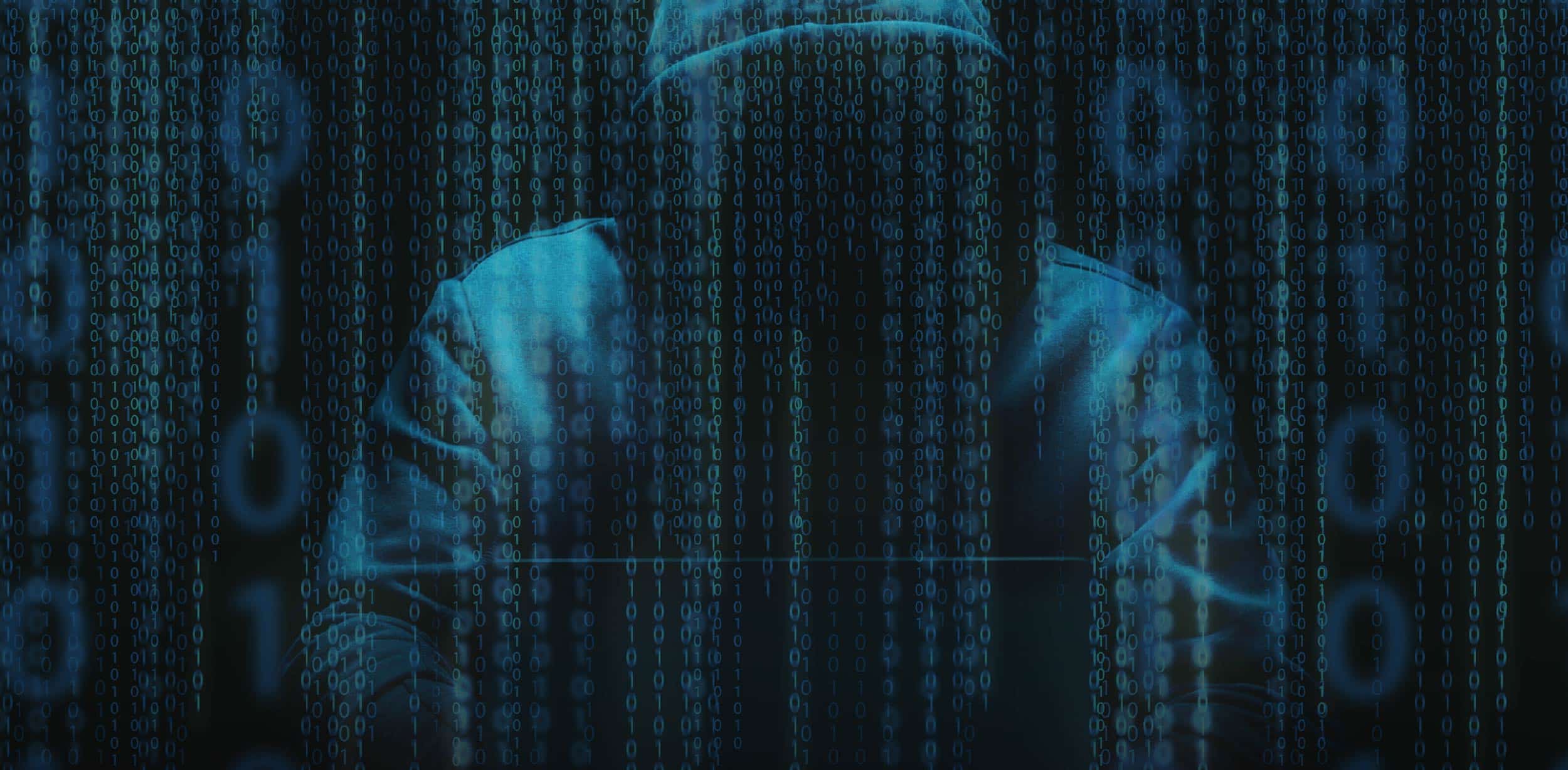 Abstract image of hacker in hoodie surrounded by binary code representing a cyber breach